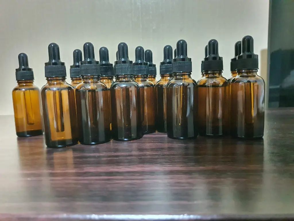 botella ade vidrio varias imagen.webp